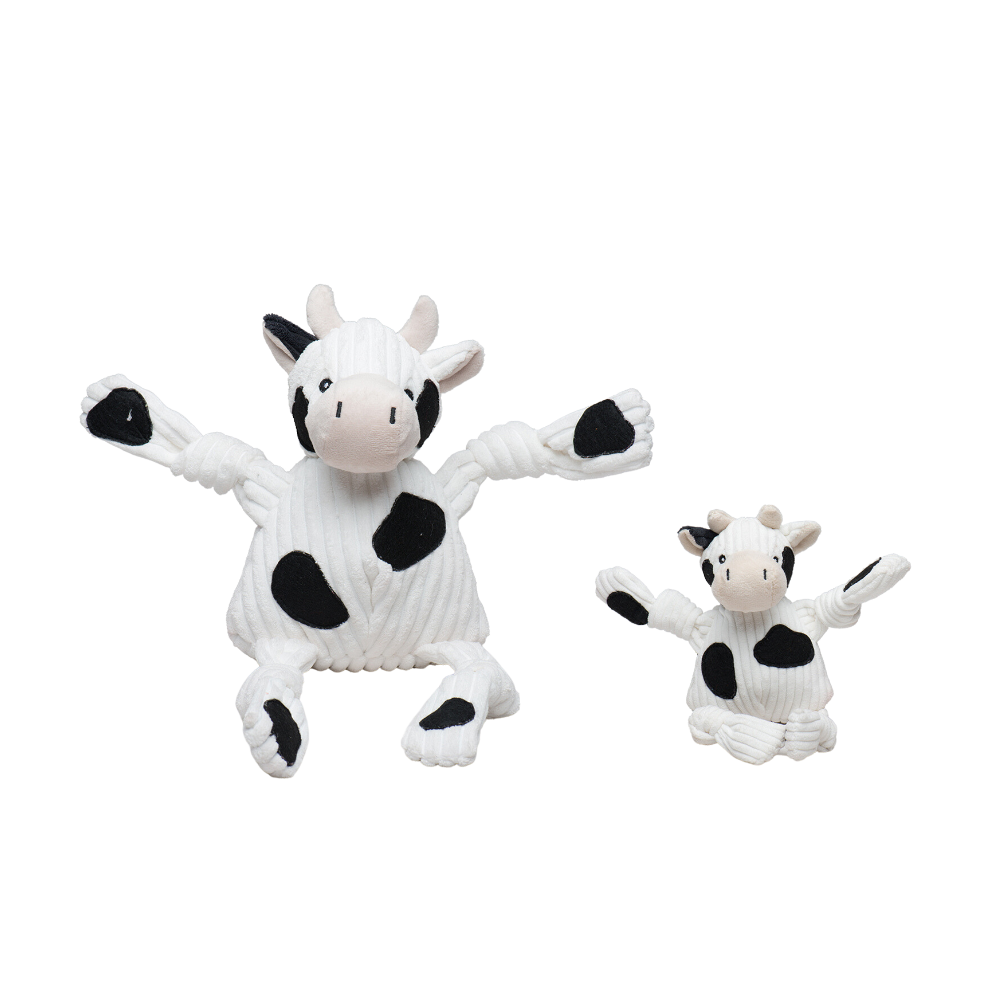 Large and Small Dottie the Cow dog toy. The cow is white with black spots all over with a white and black tail. Has five squeakers one in each arm, leg and in the stomach. Made with exclusive Tuffut Technology®.